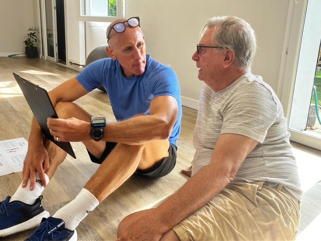 Dave in consultation - approachable personal trainer
